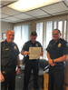 Officer Will Newman receiving a Lifesaving Award