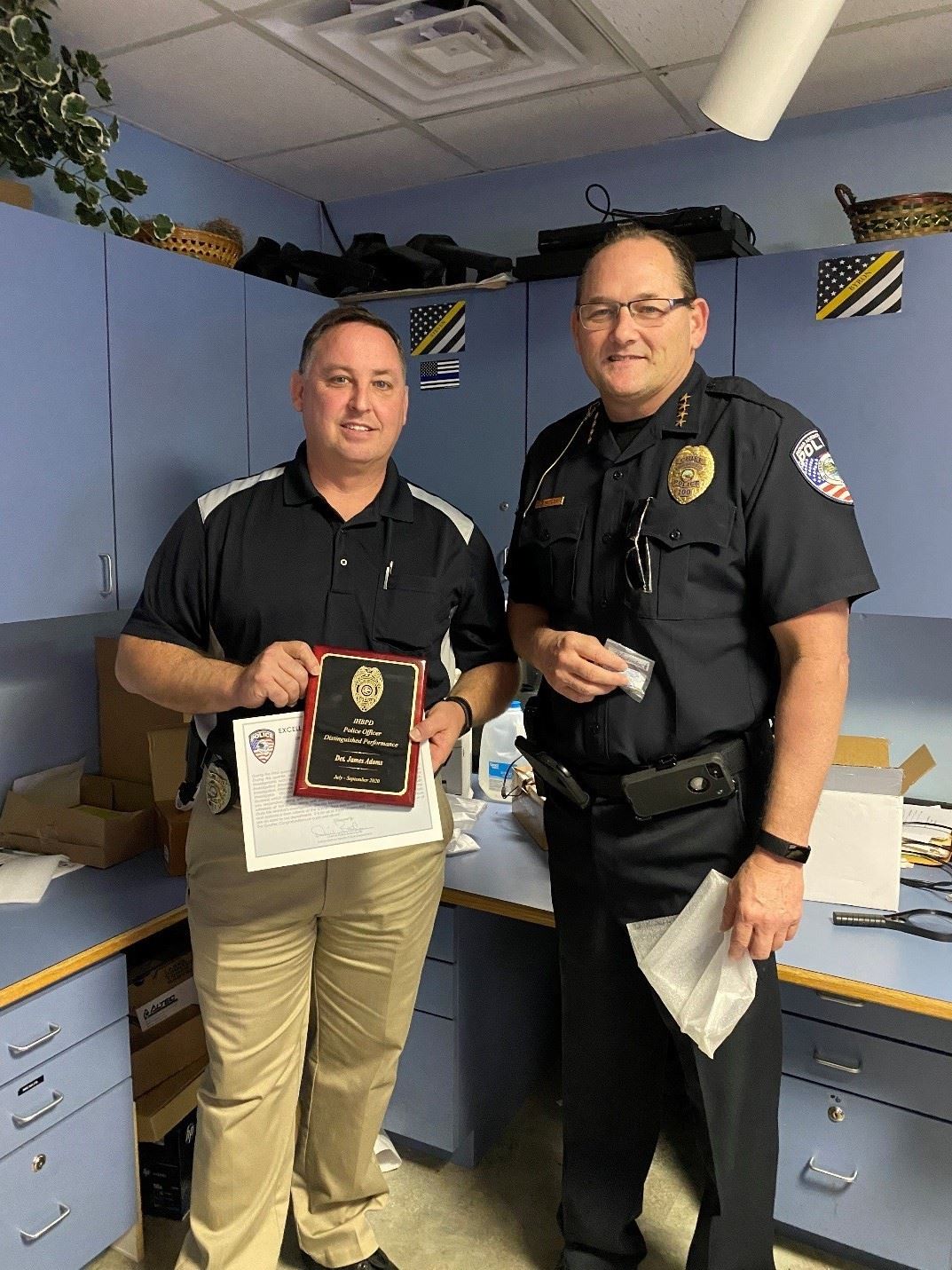 Detective Jim Adams receives the Officer of the Quarter award